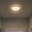 Nordlux Oja - plafonnier - Ø 29,4 x 2,3 cm - 15W LED inclus (3000K/4000K) - IP54 - noir