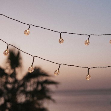 New Garden Griselda Glossy - guirlande lumineuse à énergie solaire - 4,66 mètres de guirlande dont 2 mètres de cordon - 10 lampes LED incl. - IP44 - transparent