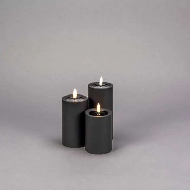 Konstsmide - Bougie à LED bloc sur piles avec flamme vacillante - Ø 7 x 10 cm - IP44 - noir